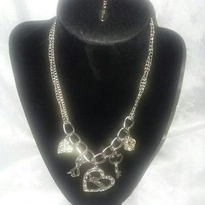 Guess charm necklace